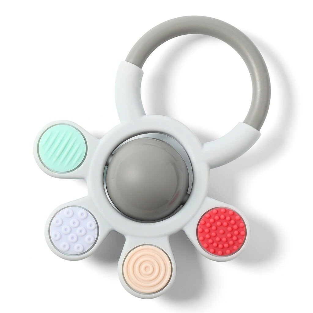 Anneau de dentition silicone et hochet