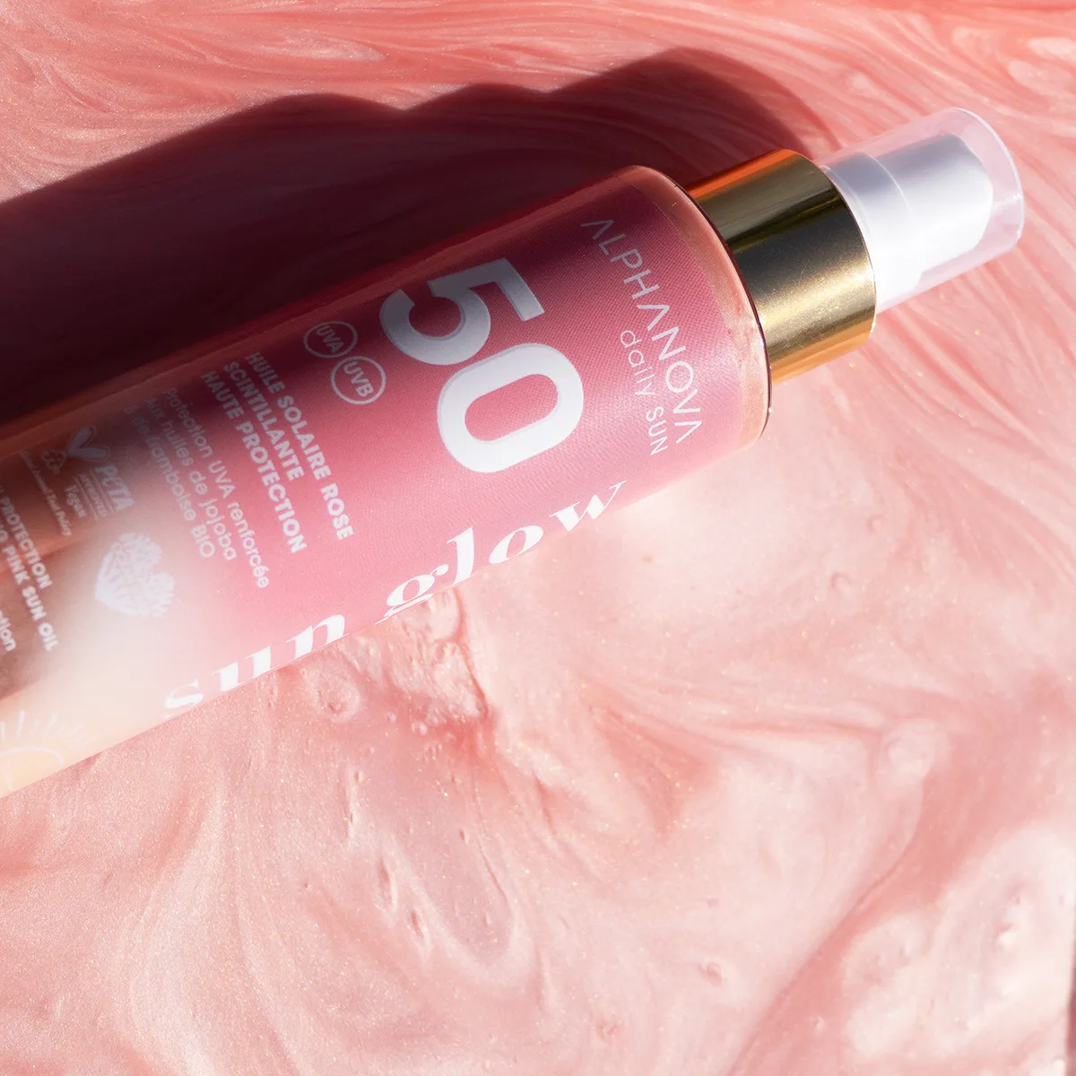 Huile solaire scintillante rose SPF50 – Image 2